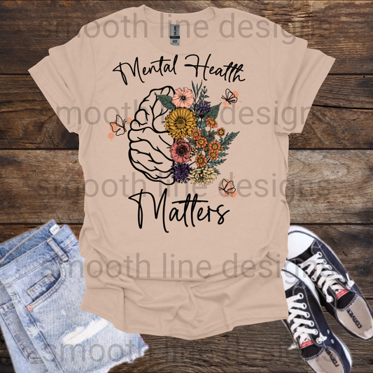 Promote mental health awareness with this "Mental Health Matters" t-shirt! Designed for therapists, counselors, or anyone passionate about mental health, this shirt is a great way to spread positivity and remind people that they matter.